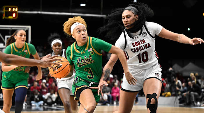 Notre Dame guard Hannah Hidalgo, center, drives against South Carolina center Kamilla Cardoso